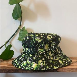 green skull bucket hat up urban outfitters